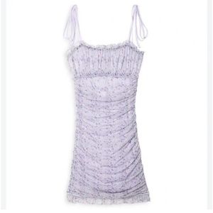Katie J NYC “Ava” lavender floral ruched mini dress.